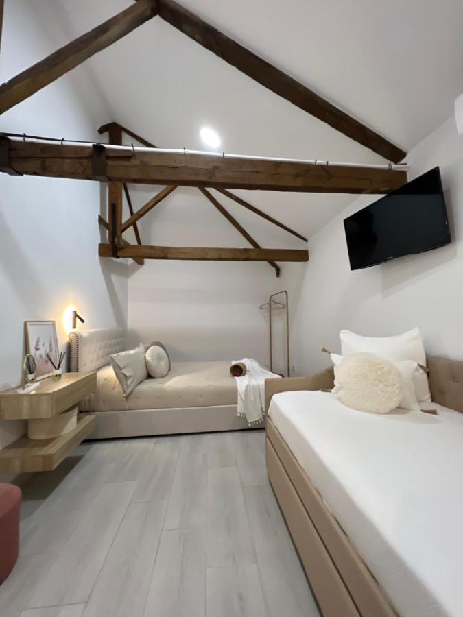Herencia Suites Chic Cozy מראה חיצוני תמונה