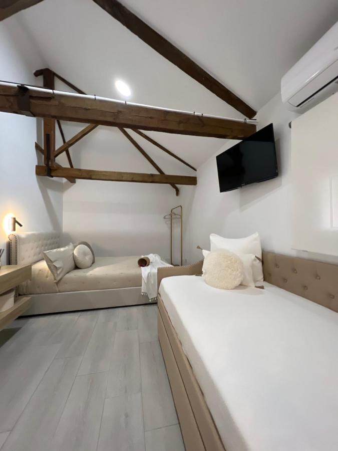 Herencia Suites Chic Cozy מראה חיצוני תמונה
